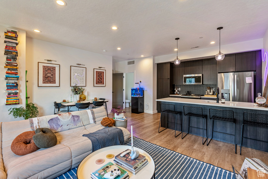 Living room featuring light hardwood / wood-style floors