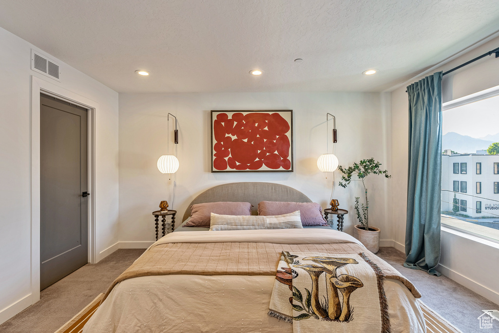 View of carpeted bedroom