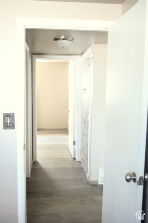 Hallway featuring hardwood / wood-style flooring