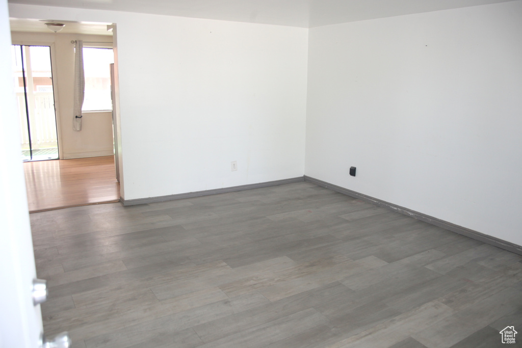 Spare room featuring hardwood / wood-style flooring