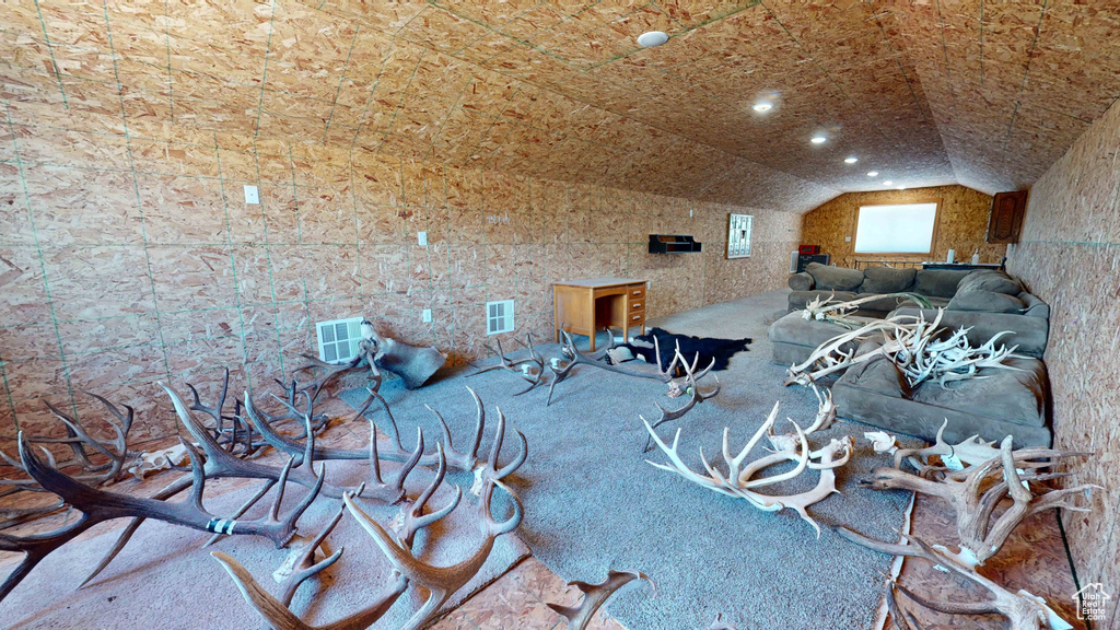 Interior space with vaulted ceiling
