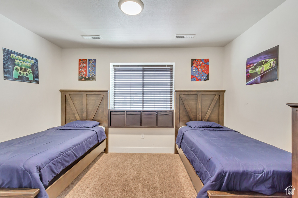 Bedroom with carpet