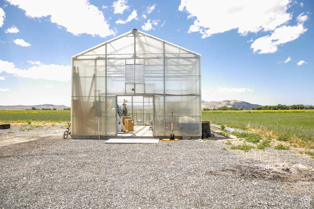 View of outdoor structure featuring a mountain view