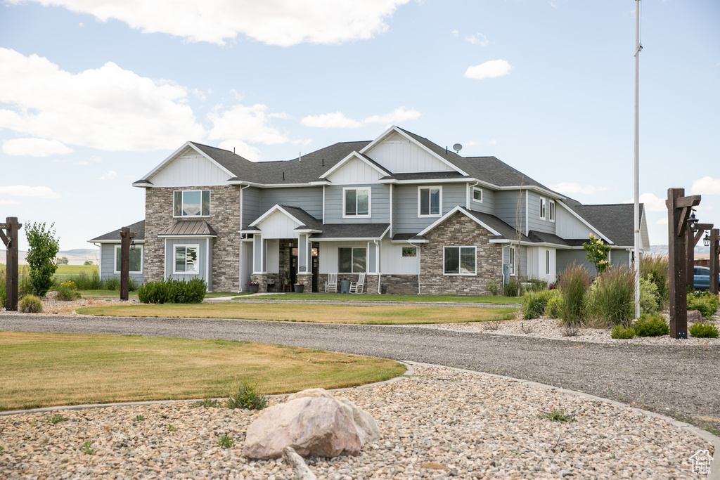 View of front of house featuring a front lawn