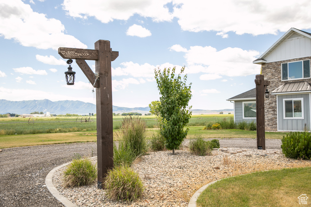 View of yard featuring a mountain view and a rural view