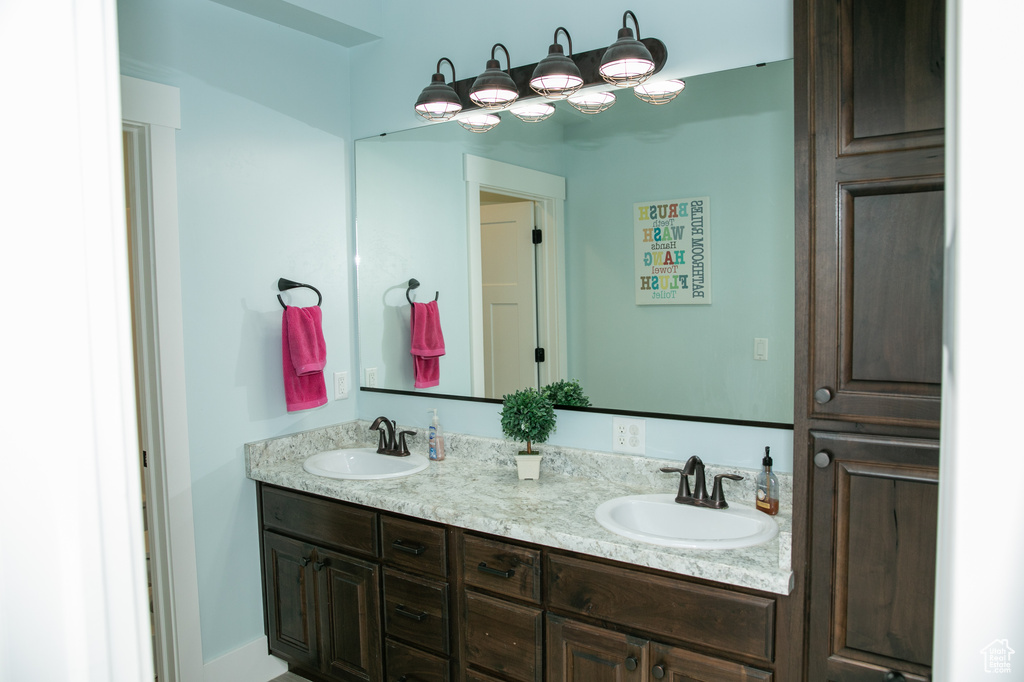 Bathroom featuring double vanity