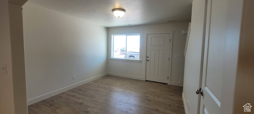 Unfurnished room featuring light hardwood / wood-style floors