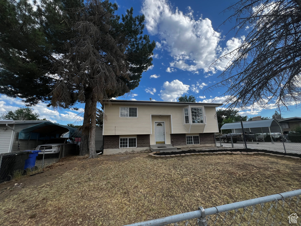 Bi-level home with a carport