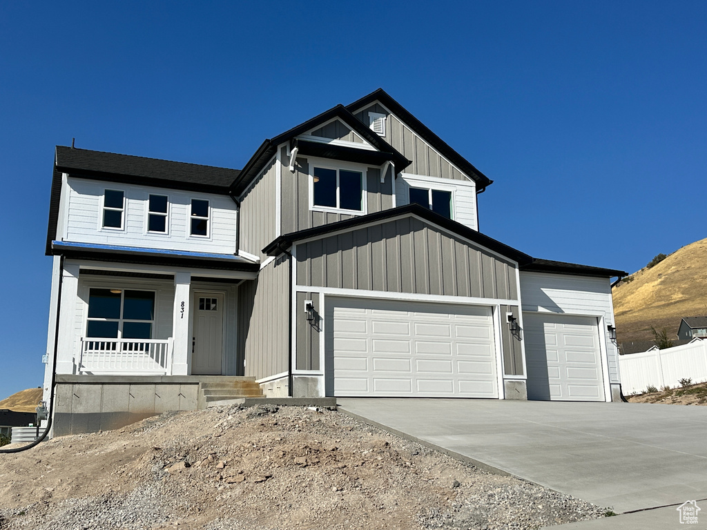 View of front of property featuring covered porch