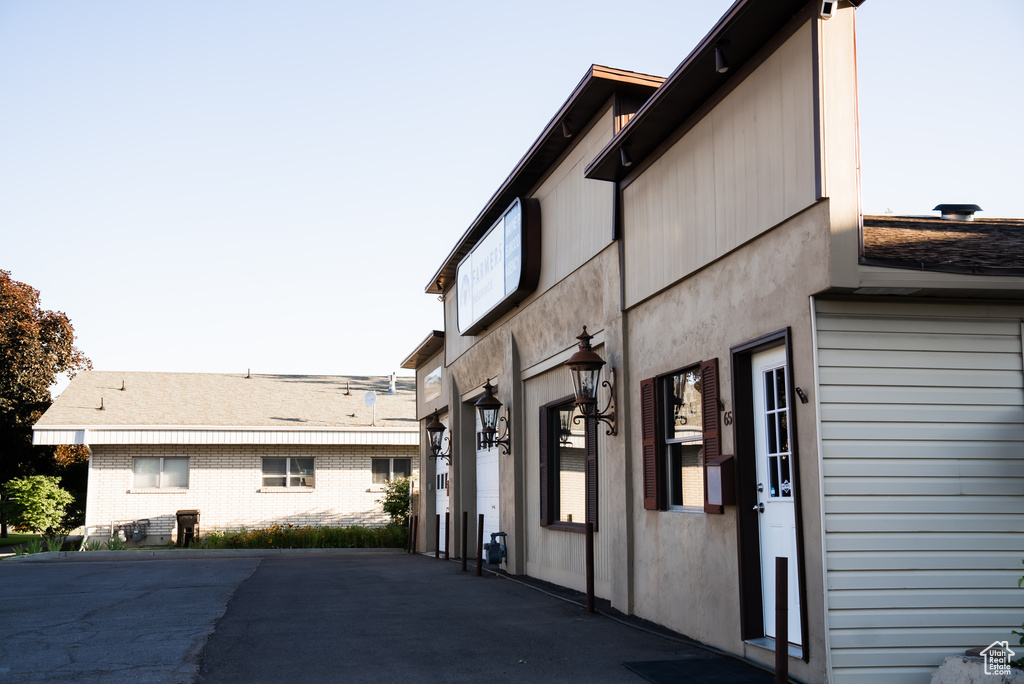 View of property exterior with a patio