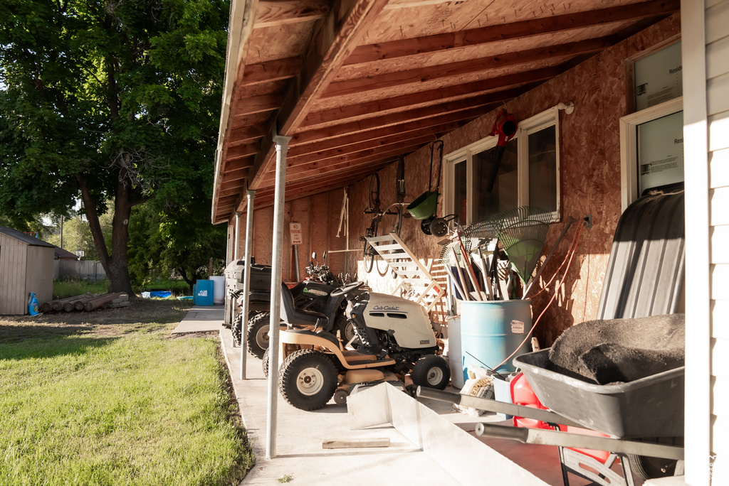 Exterior space featuring a lawn