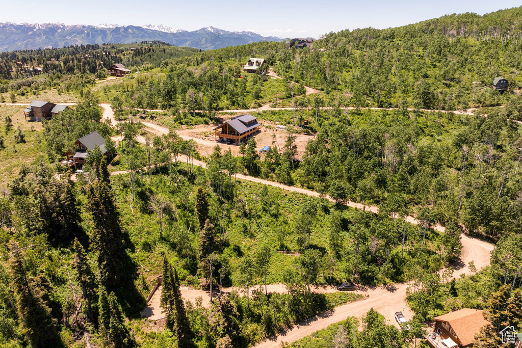 Birds eye view of property featuring a mountain view