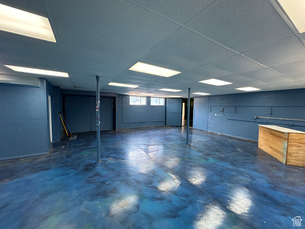 Basement featuring a paneled ceiling