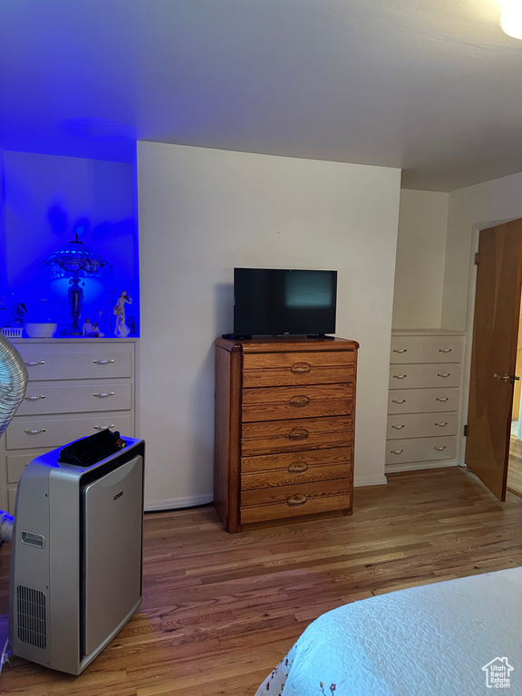 Bedroom featuring hardwood / wood-style floors