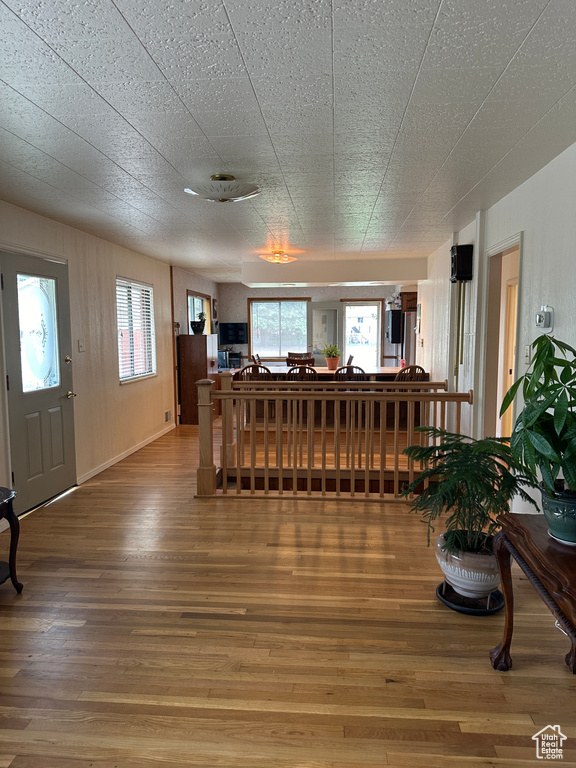 Living room with hardwood / wood-style flooring