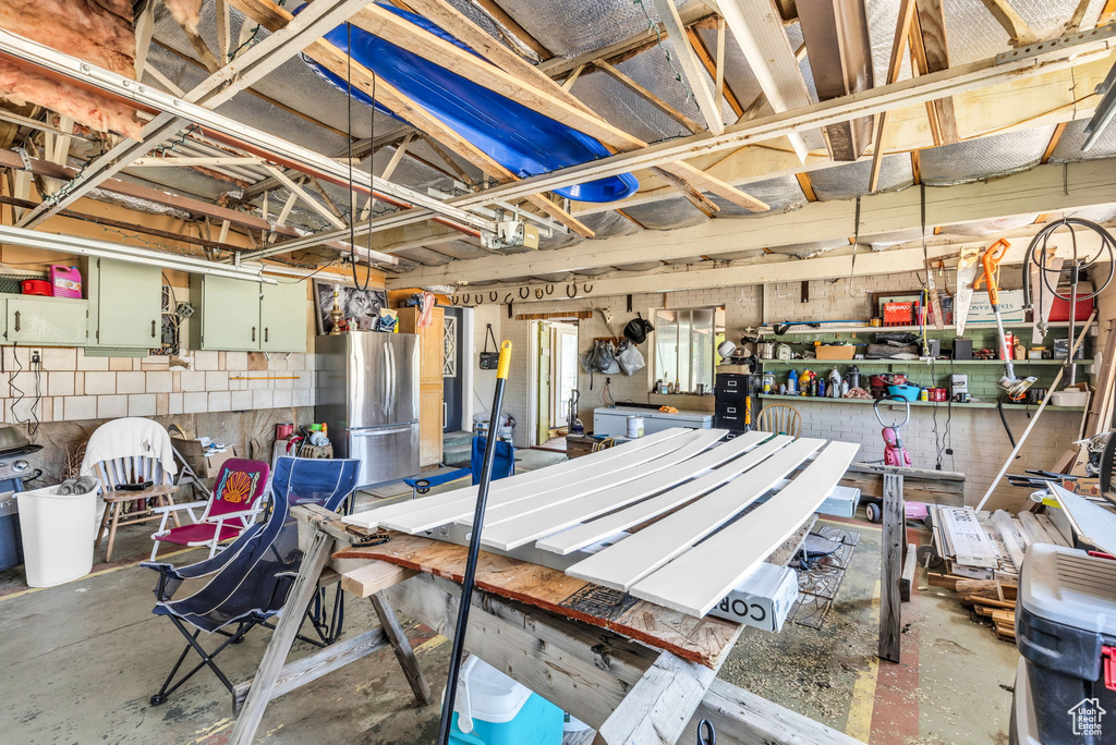 Interior space with concrete floors and a workshop area