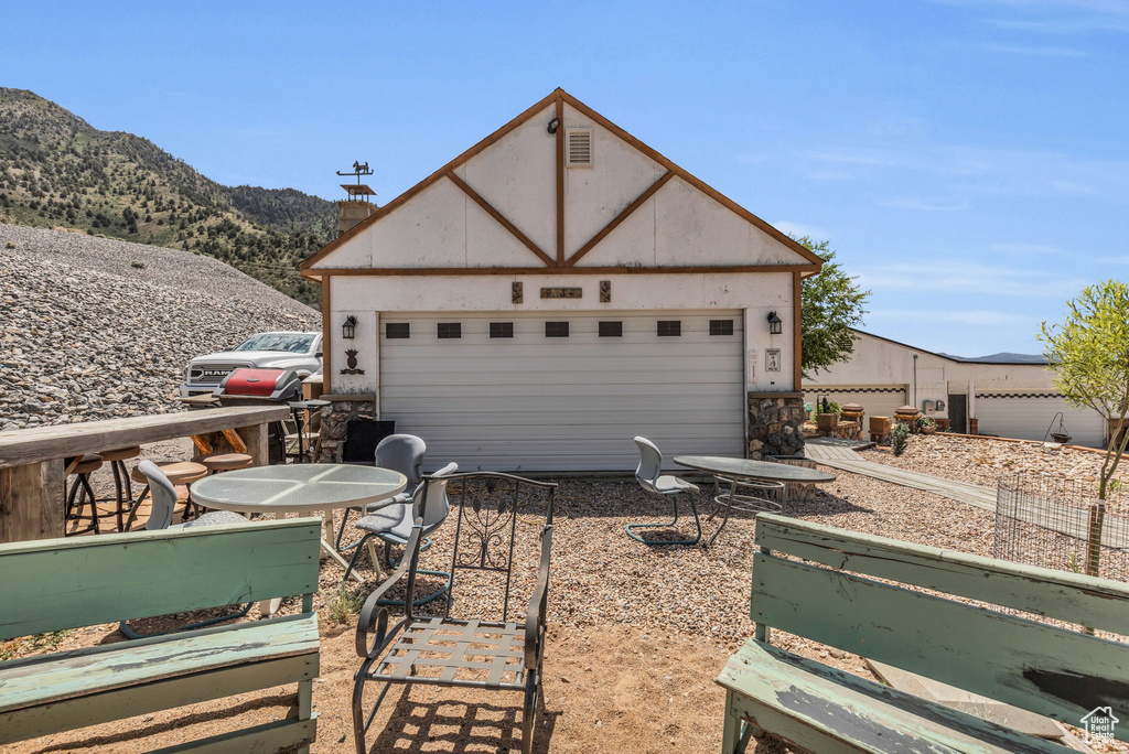 Garage featuring a mountain view