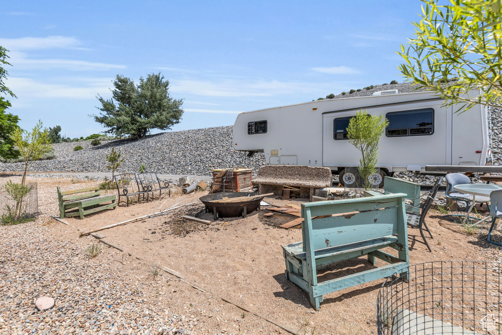 View of patio / terrace with a fire pit