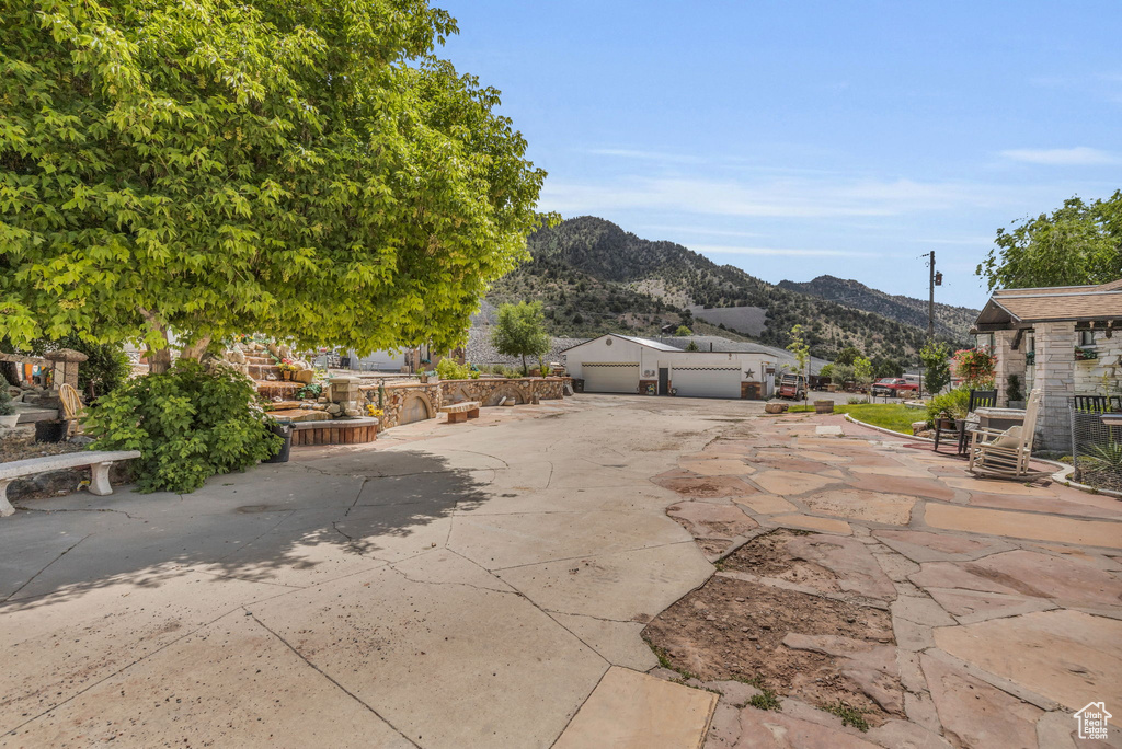 View of patio / terrace with a mountain view