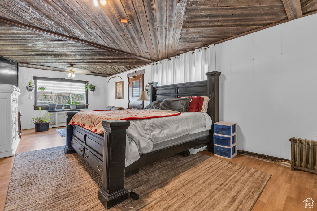 Bedroom featuring wood-type flooring and wooden ceiling