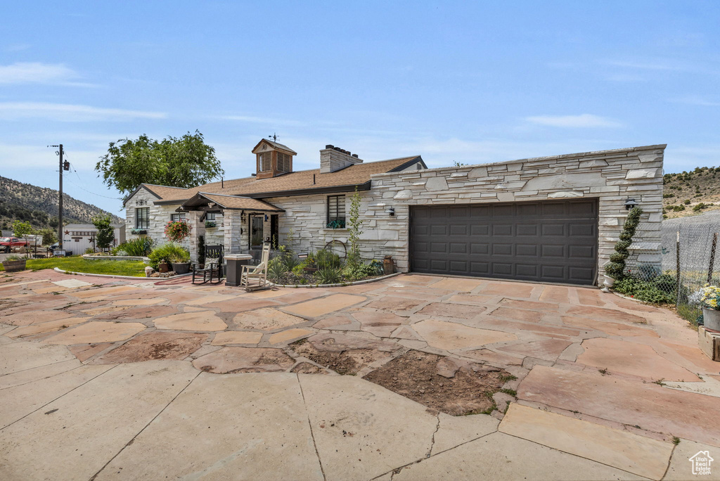 Single story home with a garage