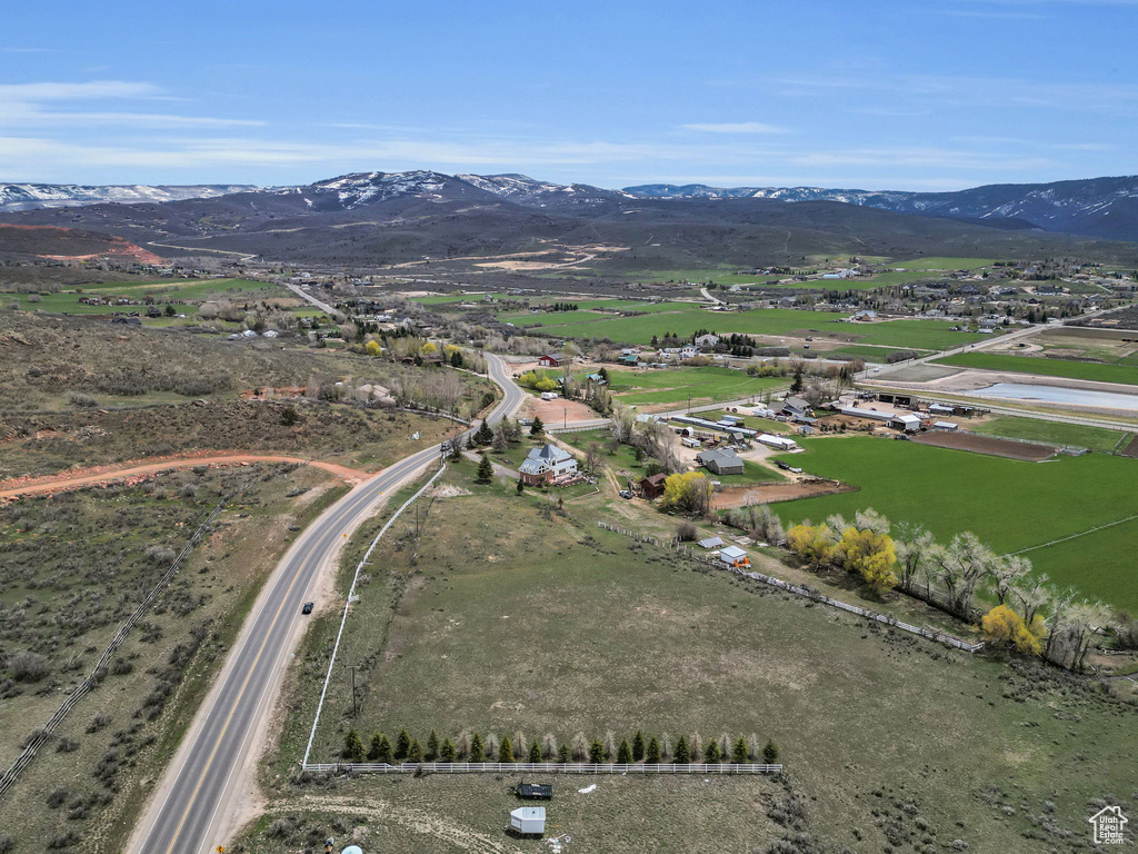 Birds eye view of property featuring a mountain view