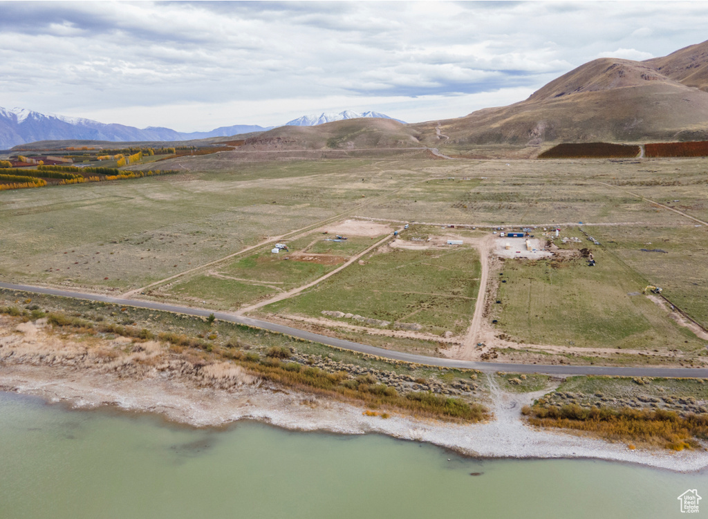 Aerial view with a rural view and a water and mountain view