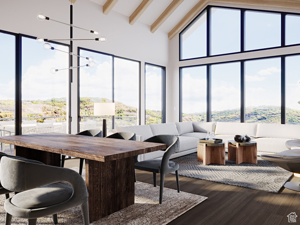 Sunroom / solarium with lofted ceiling with beams and a notable chandelier