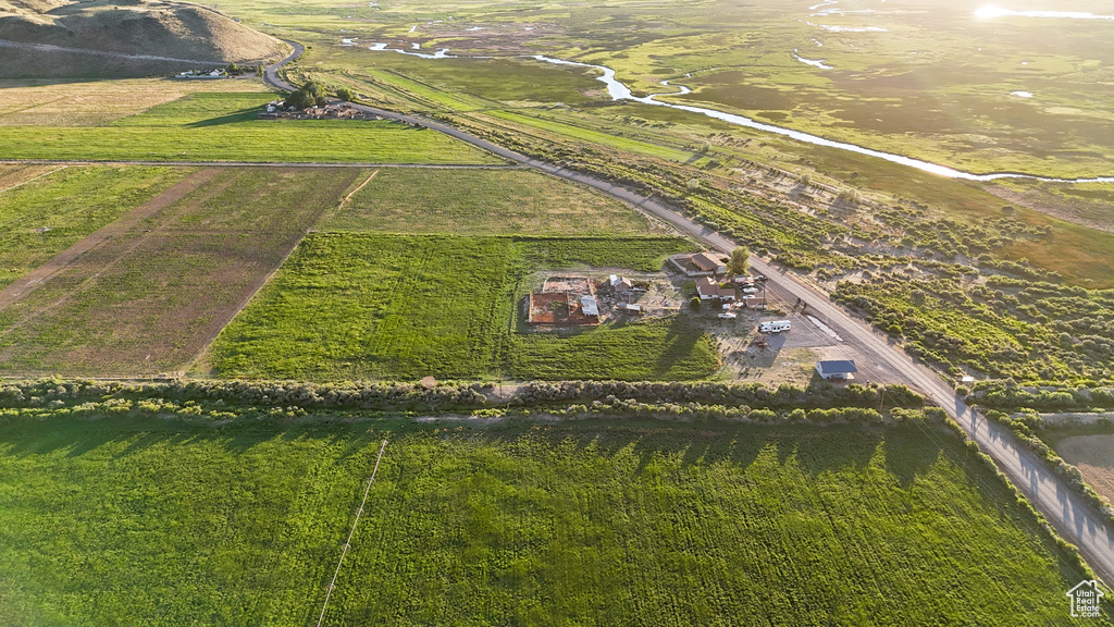 Birds eye view of property with a rural view