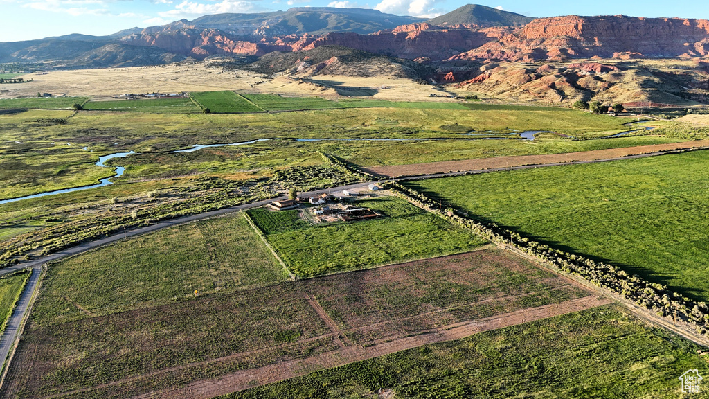 Birds eye view of property featuring a rural view and a mountain view