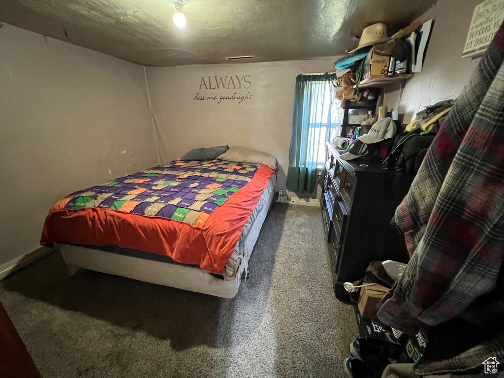 Bedroom featuring carpet