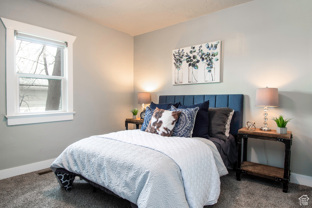 View of carpeted bedroom