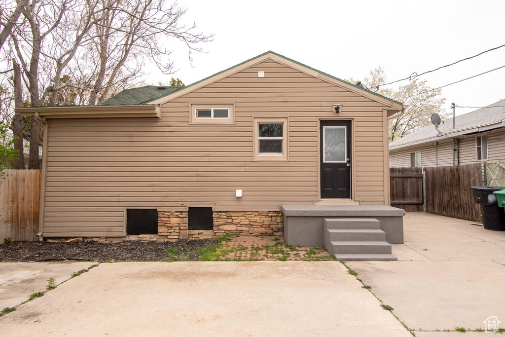 Rear view of house featuring a patio