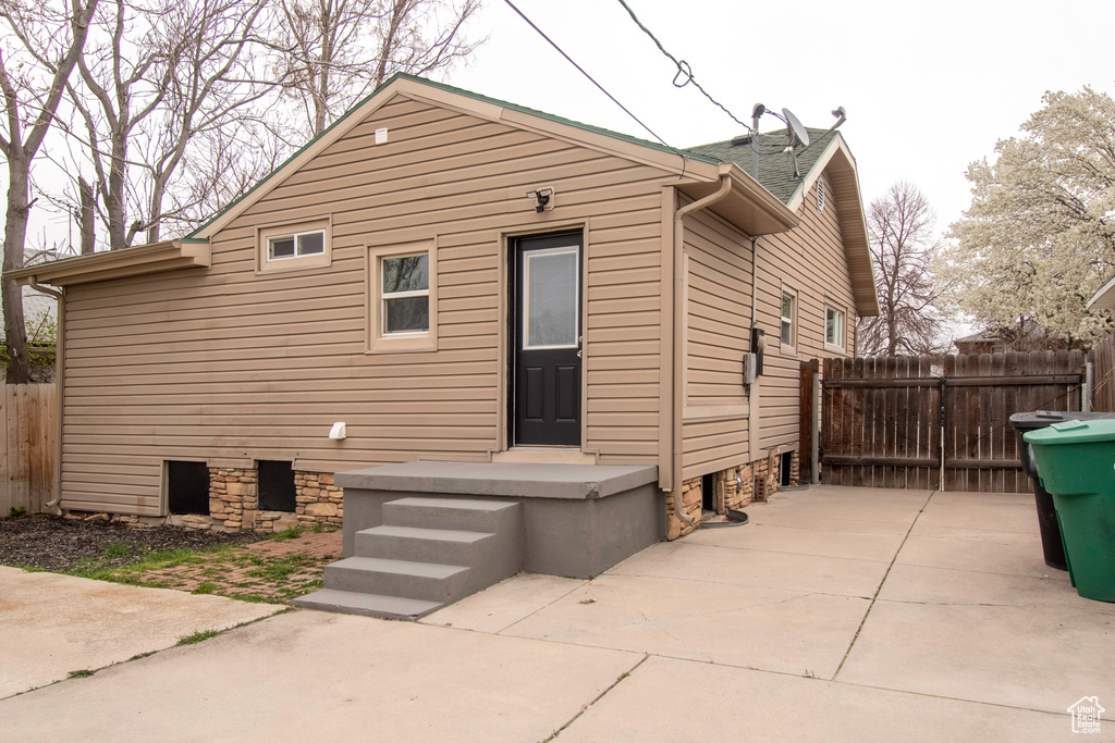 View of side of property featuring a patio