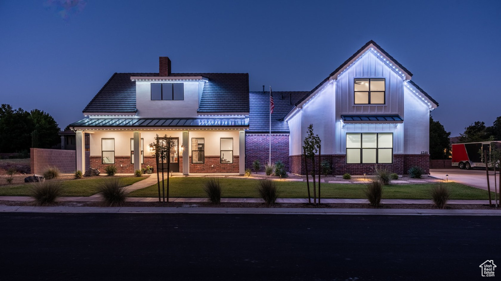 View of front of property featuring a front yard