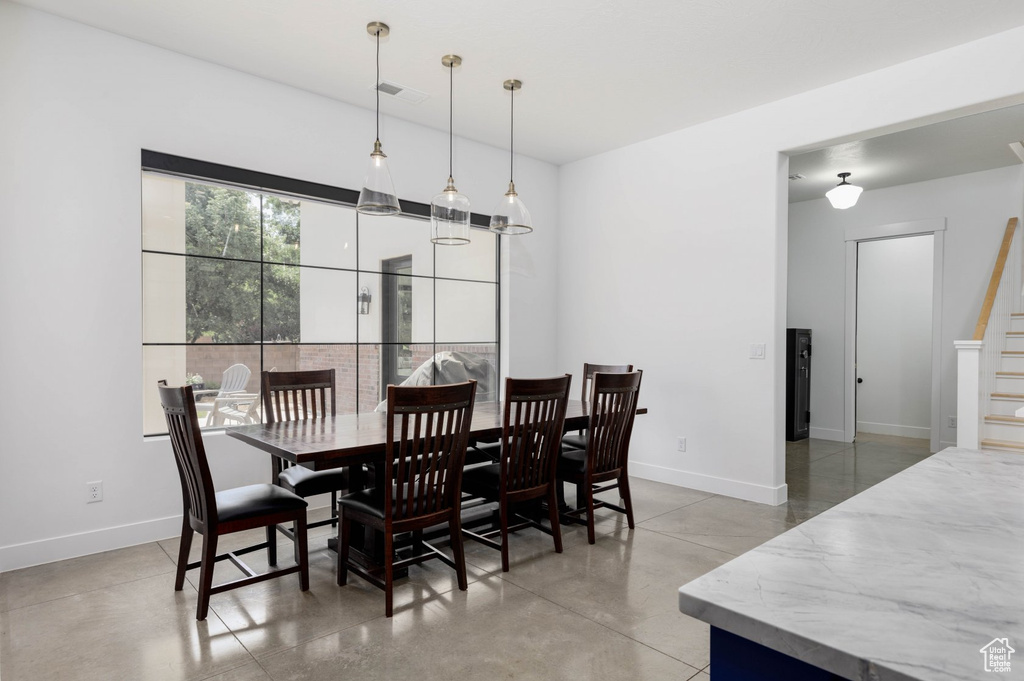 Dining area with concrete floors