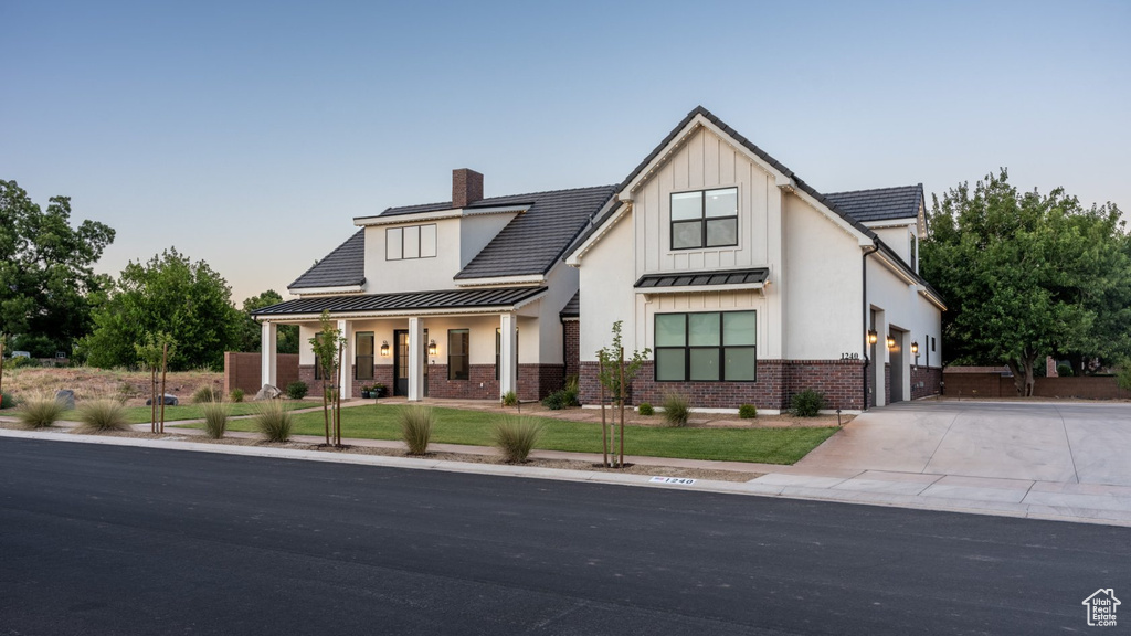 View of modern farmhouse style home