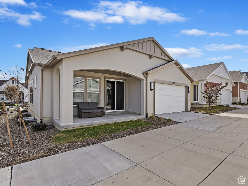 View of front of home featuring a garage