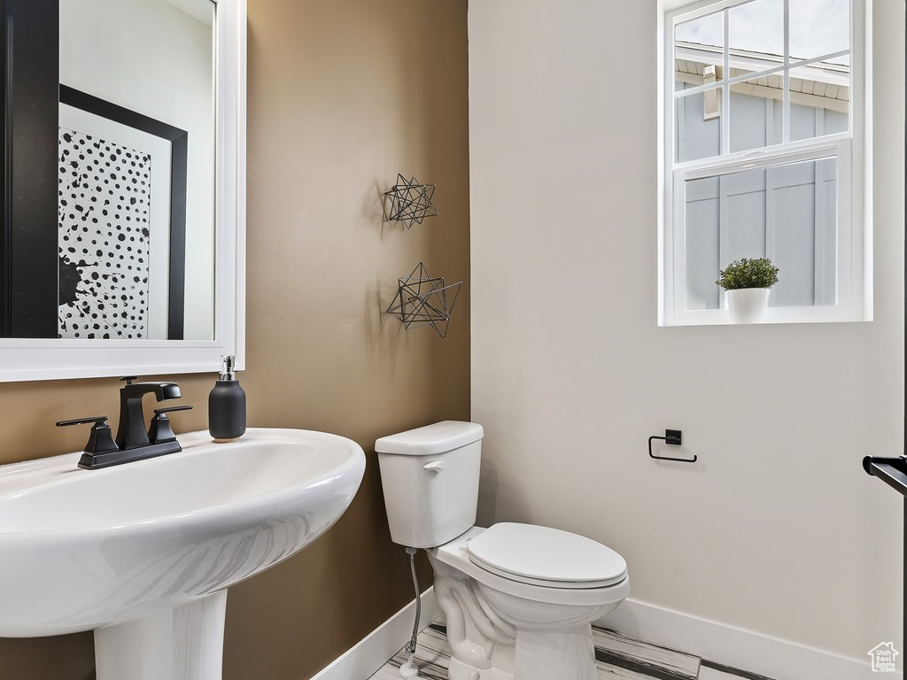 Bathroom featuring toilet and sink