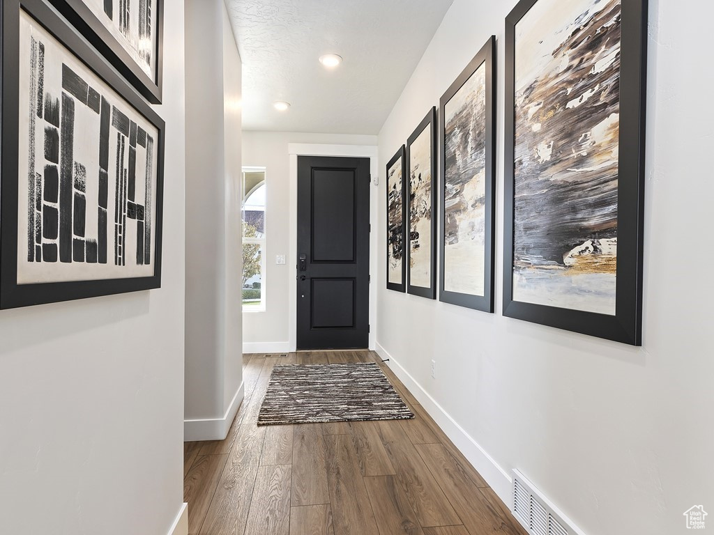 Interior space with hardwood / wood-style floors