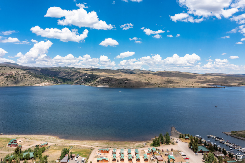 Property view of water with a mountain view