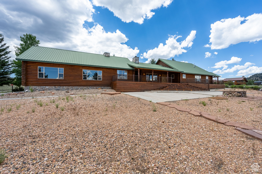 View of front of property with a patio