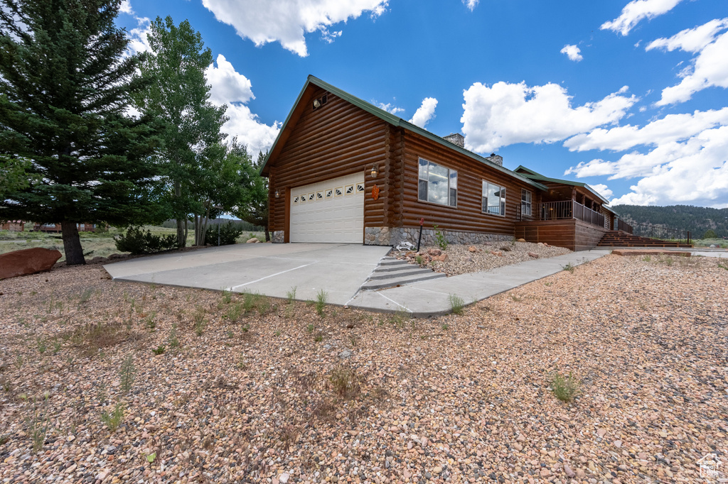 View of home's exterior featuring a garage