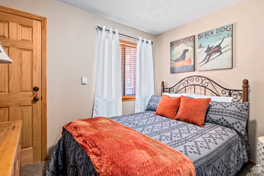 Bedroom with carpet flooring