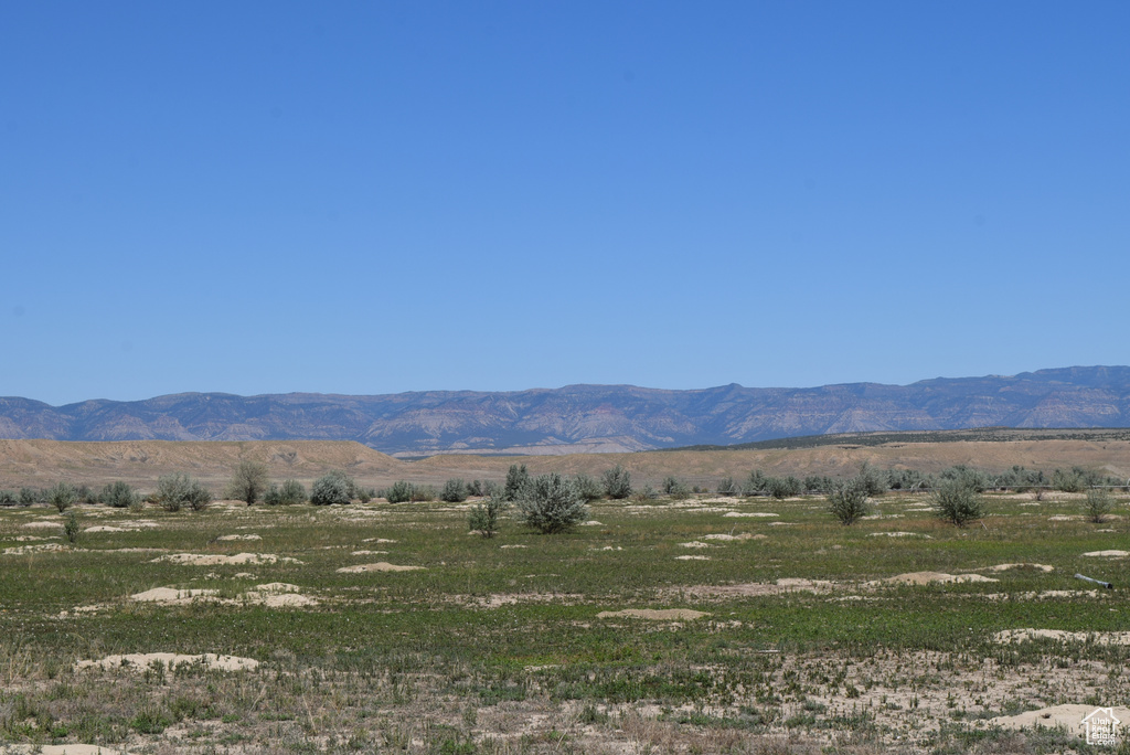 Property view of mountains featuring a rural view