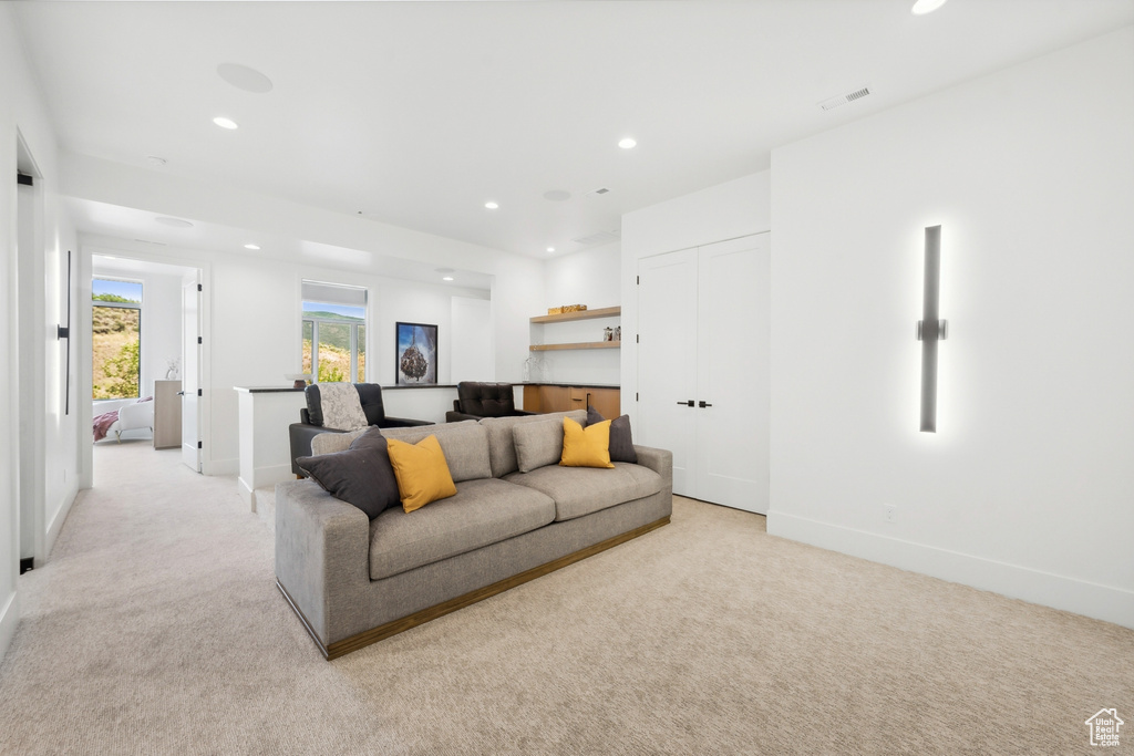 Living room with light carpet