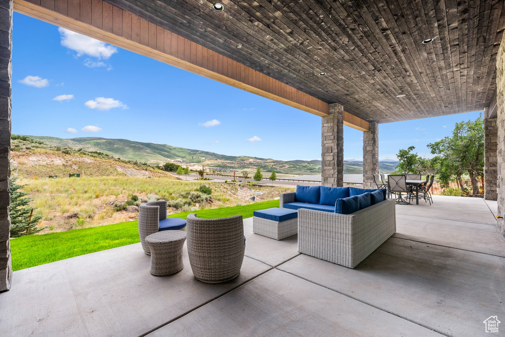 View of patio / terrace featuring outdoor lounge area and a mountain view