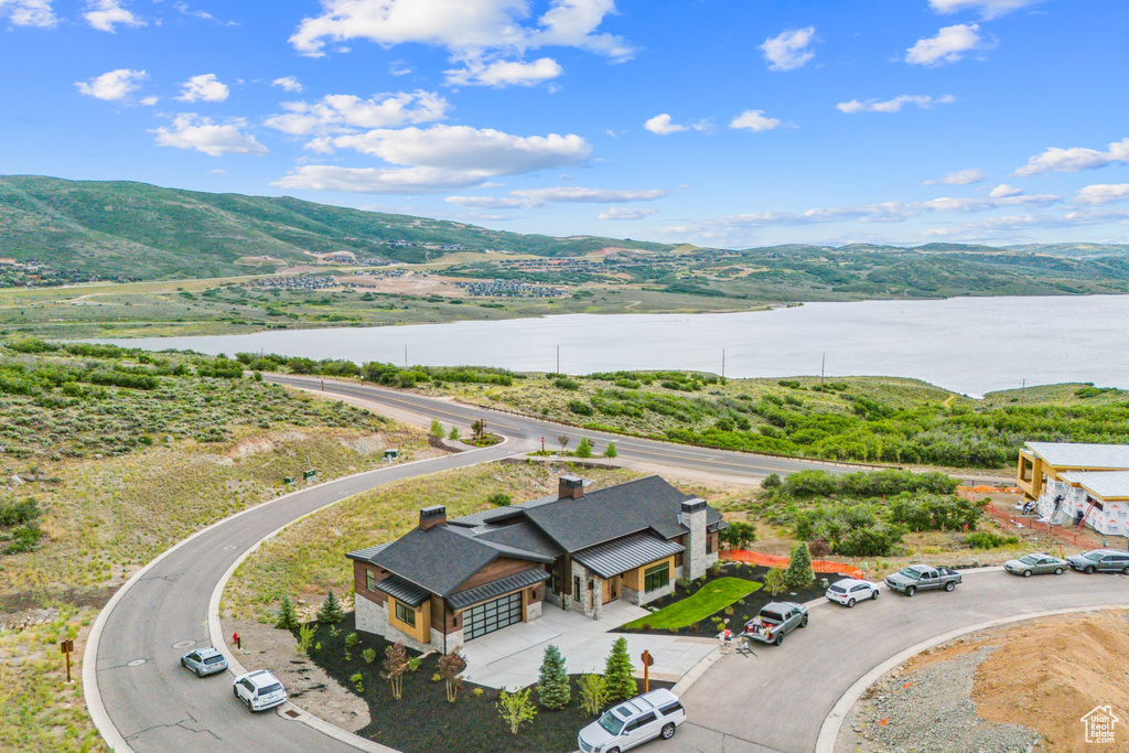 Bird's eye view with a water and mountain view