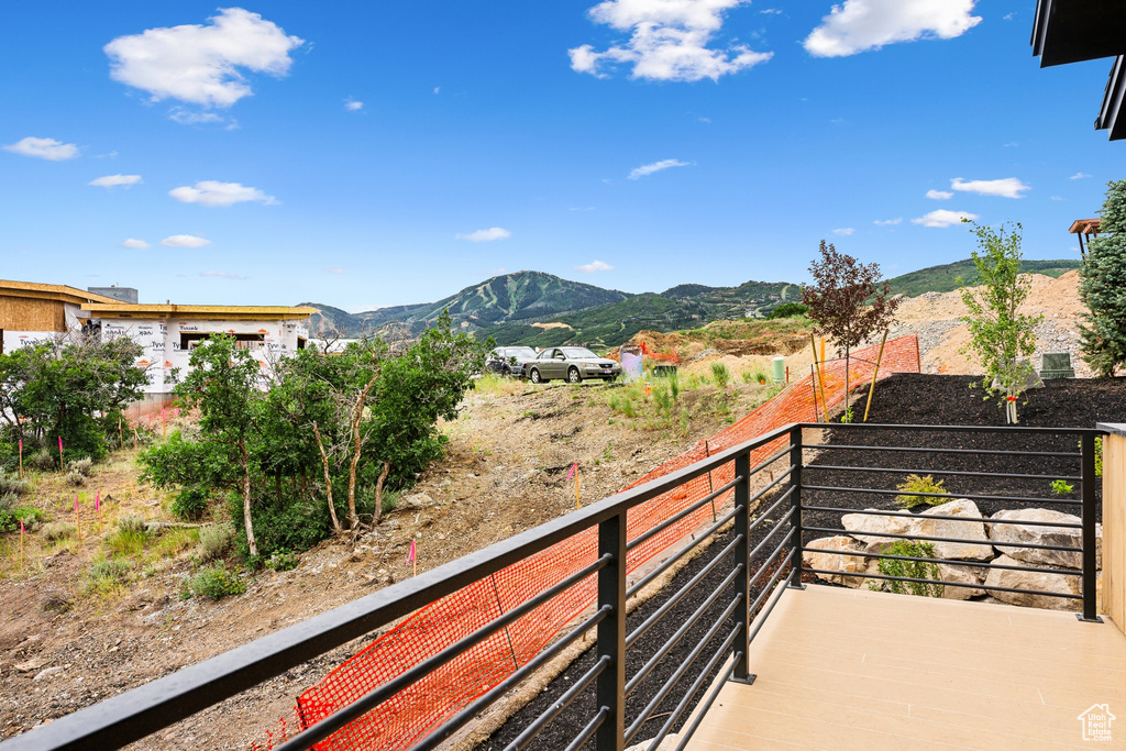 Balcony featuring a mountain view