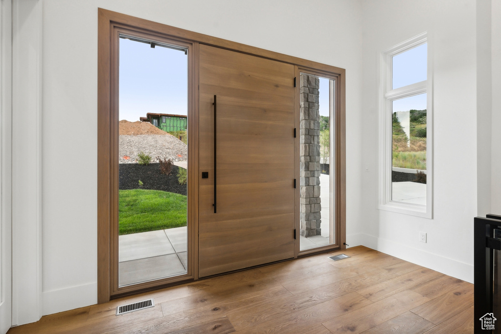 Foyer entrance featuring light wood-type flooring